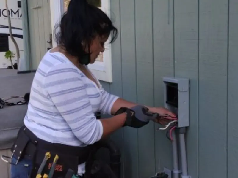 Licensed electrician wiring an exterior subpanel in Centralia
