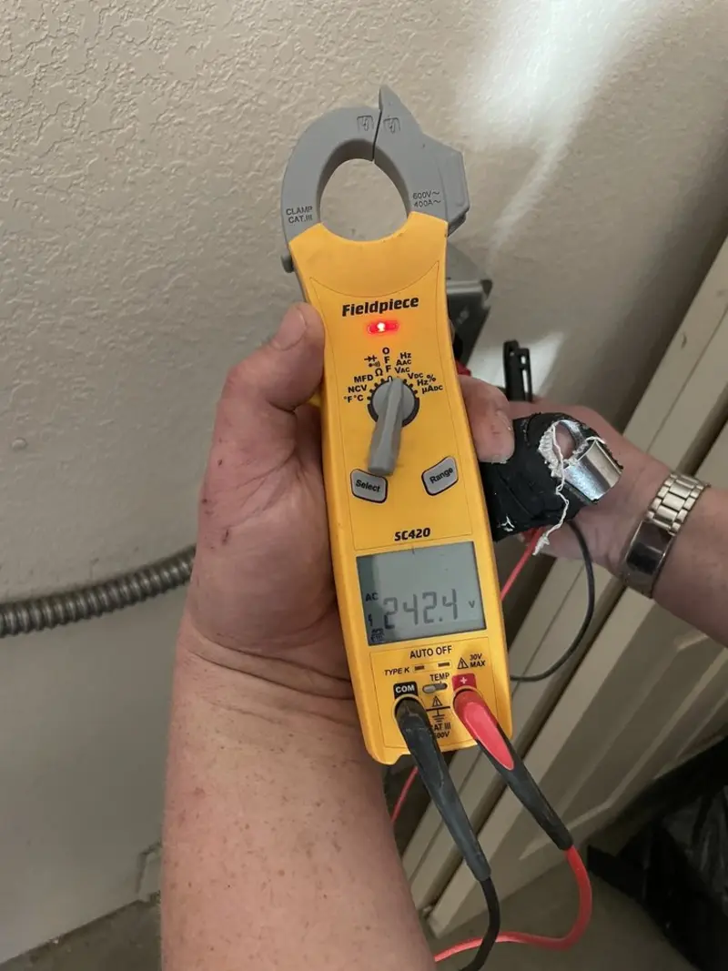 Voltage testing with clamp meter during Electrical Installation Services in Centralia
